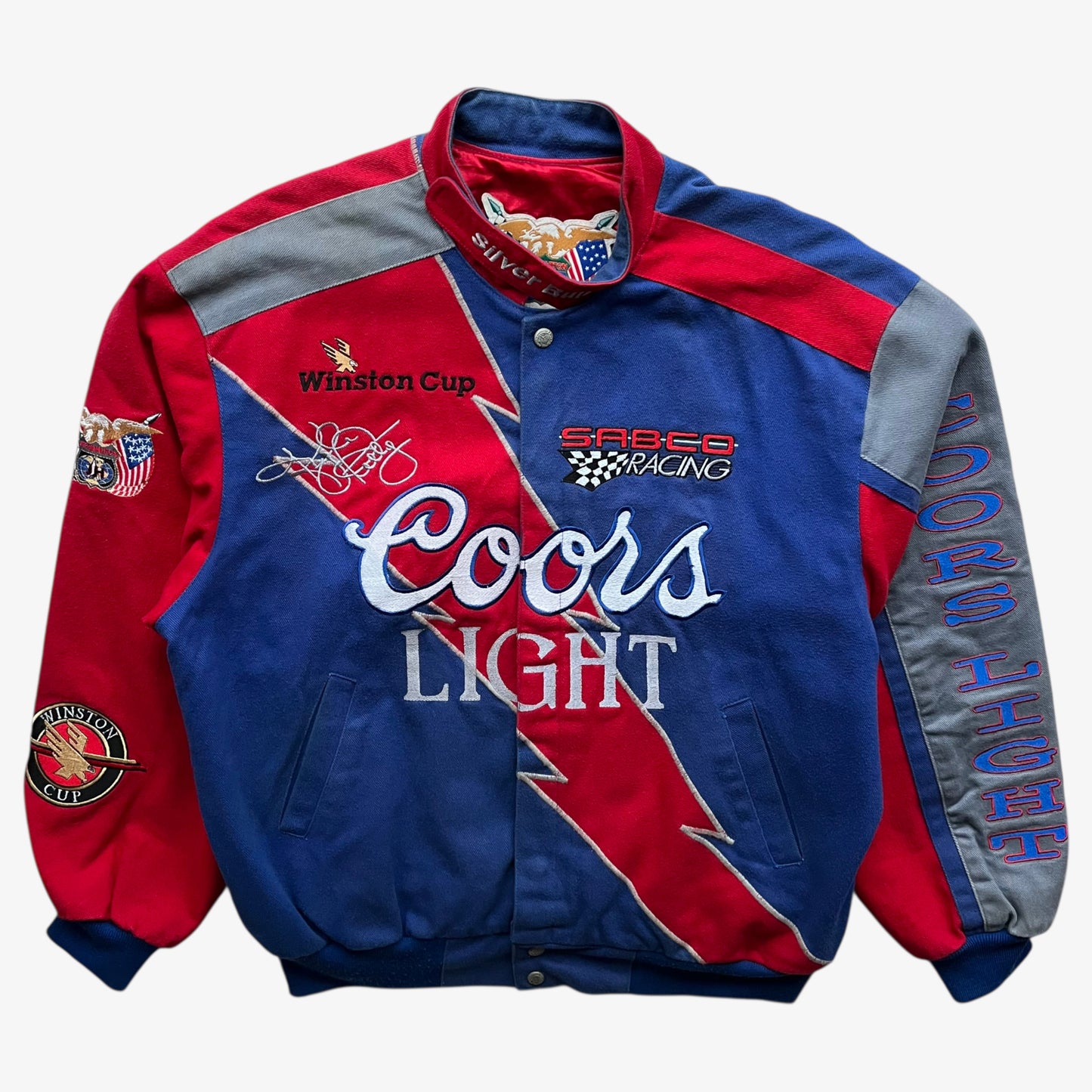Vintage 90s men's Jeff Hamilton Coors Light silver bullet nascar jacket featuring an embroidered lightning bolt.
