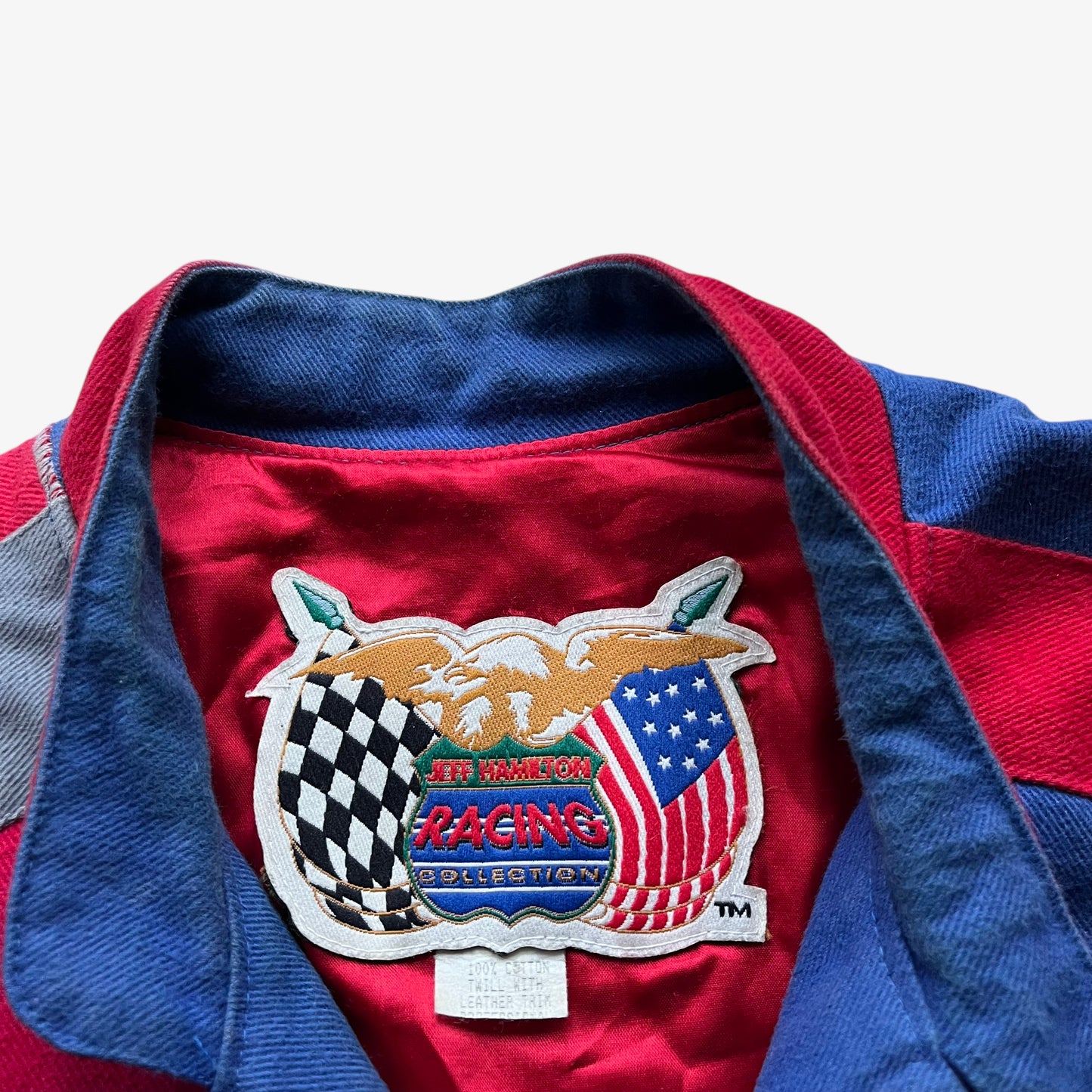 Jeff Hamilton racing collection label stitched inside of a vintage 90s men's Coors Light silver bullet nascar jacket.