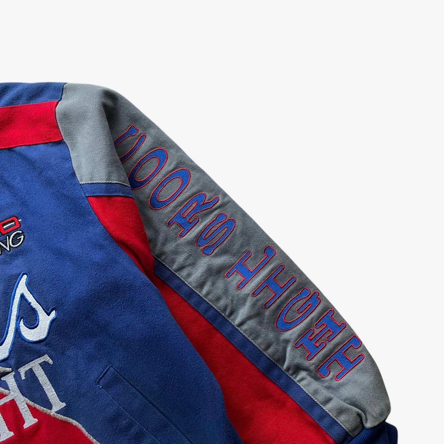 Coors light embroidered spell out sleeve on a vintage 90s men's Jeff Hamilton silver bullet nascar jacket.