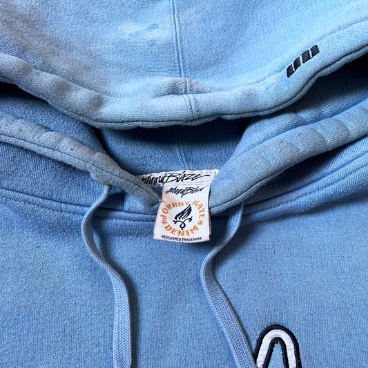 Johnny Blaze label inside of a vintage 90s men's blue hoodie.