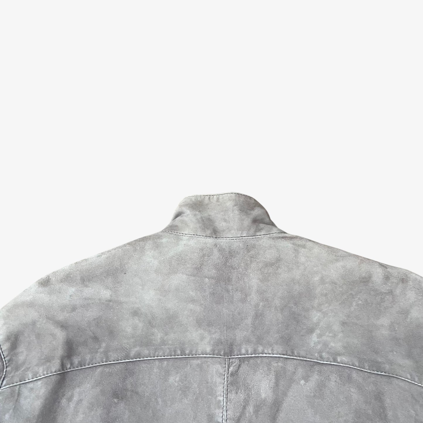 Collar of vintage 90s Just Cavalli men’s faded beige leather jacket.
