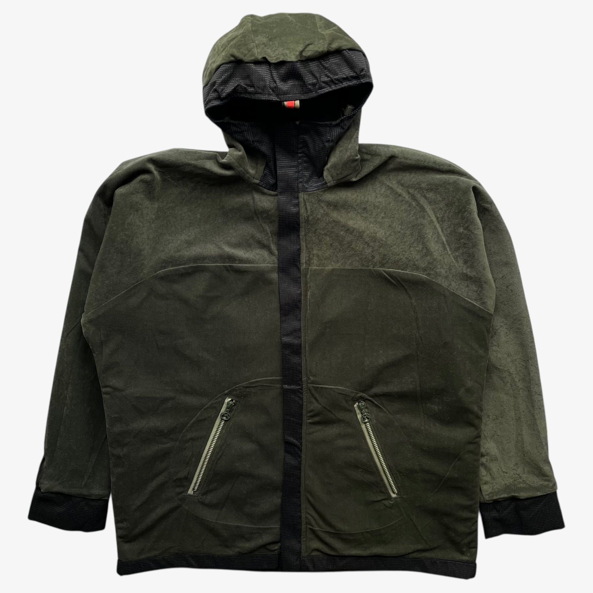 Vintage 90s men's Maharishi khaki reversible utility jacket on a white background.
