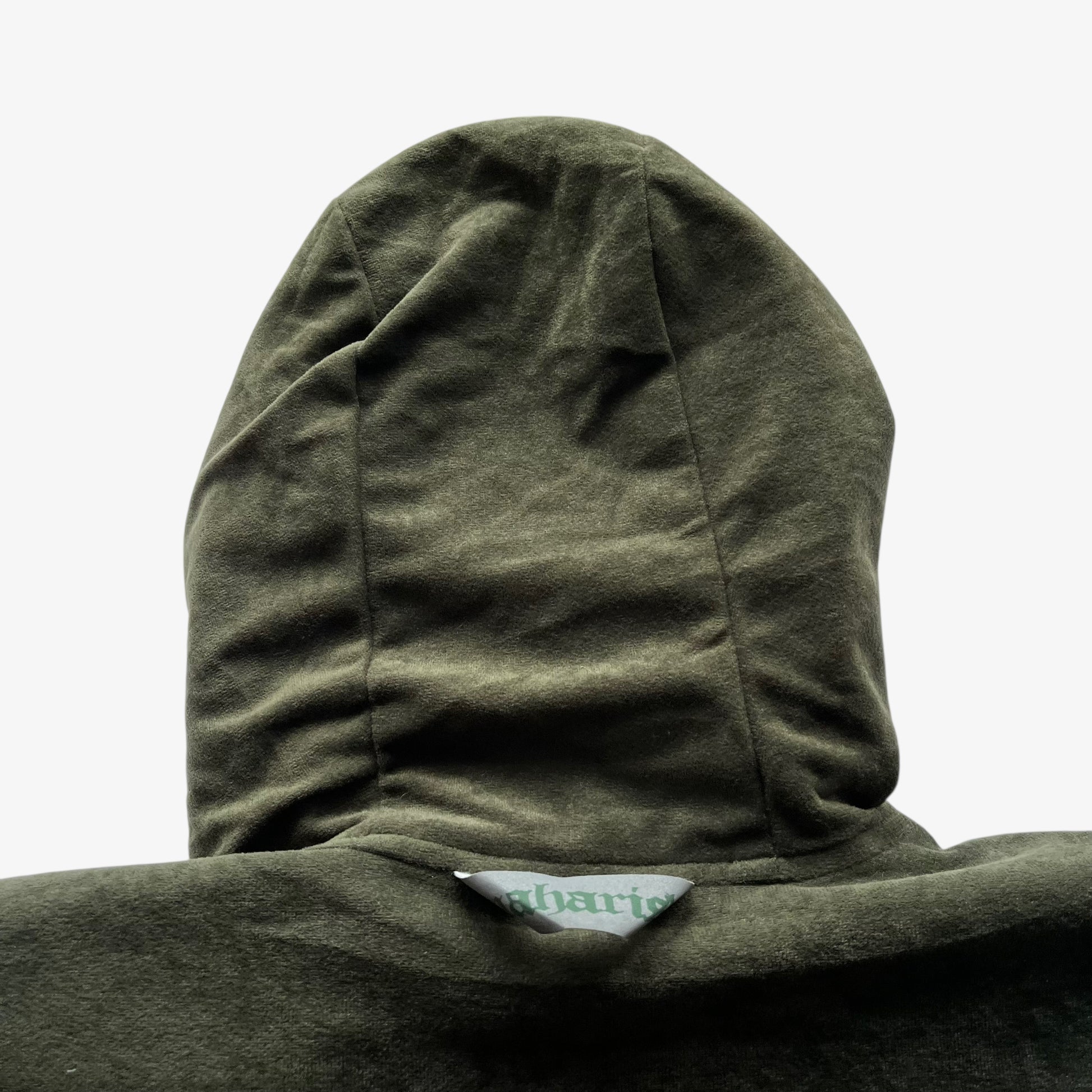 Khaki hood with a vintage 90s Maharishi brand tag attached.