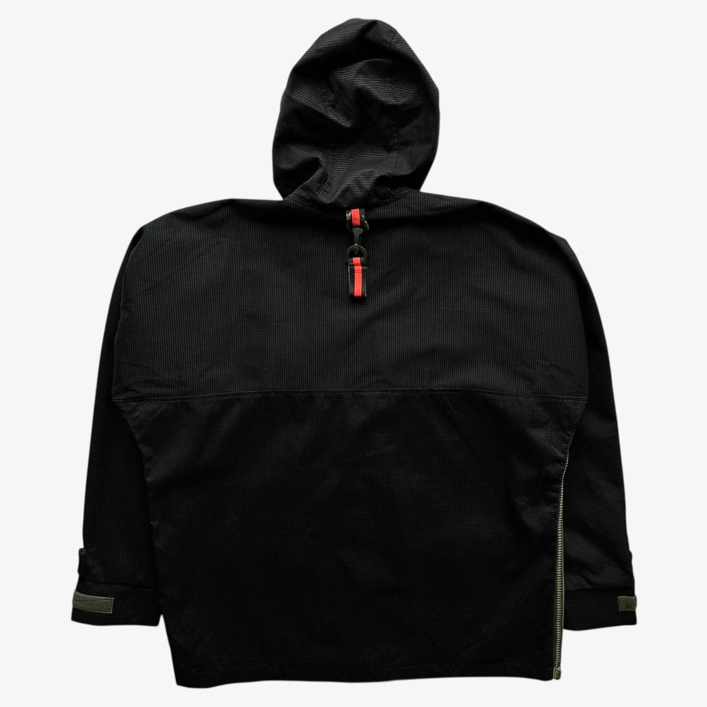 Back of vintage 90s men's Maharishi 3M Scotchlite reflective utility jacket on a white background.