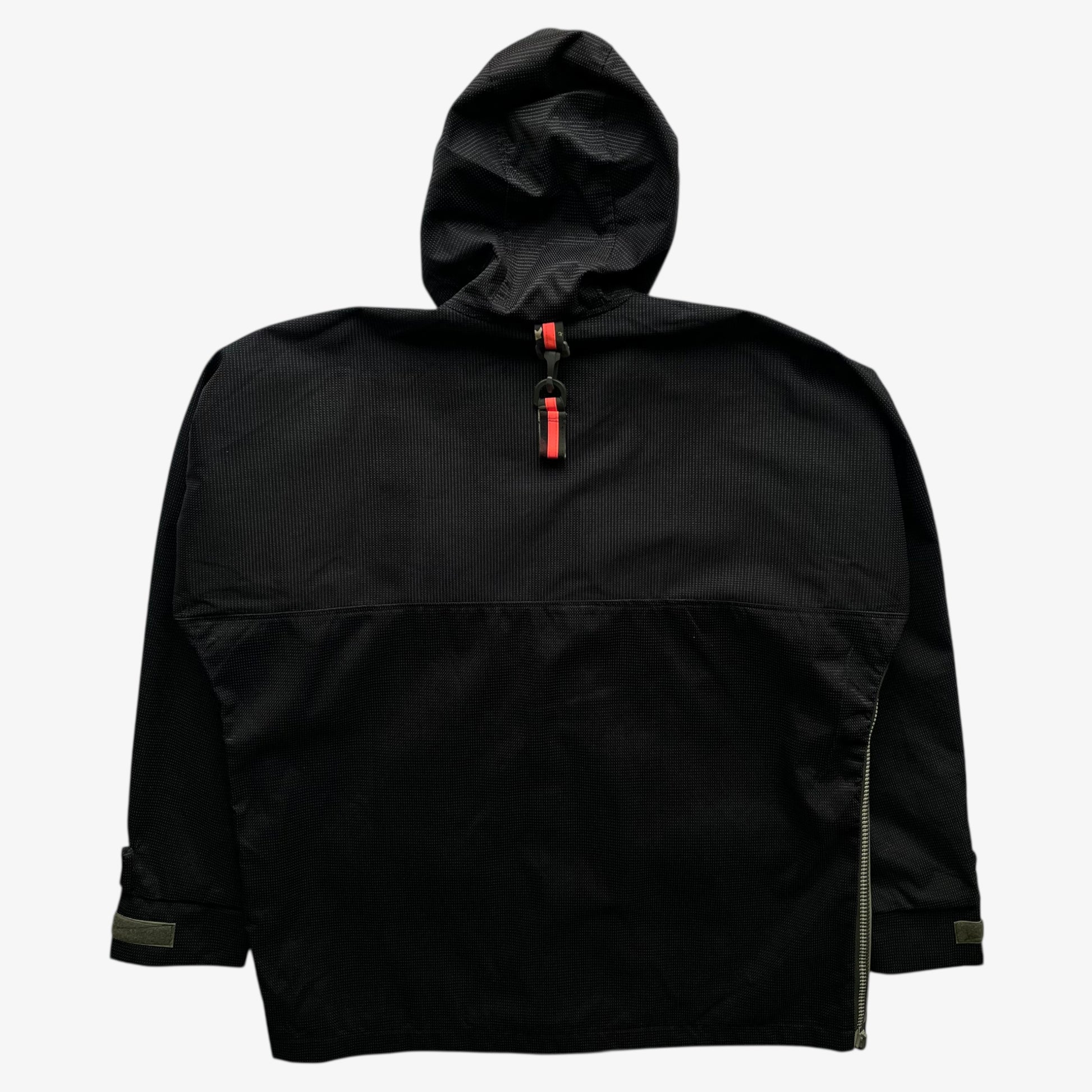 Back of vintage 90s men's Maharishi 3M Scotchlite reflective utility jacket on a white background.