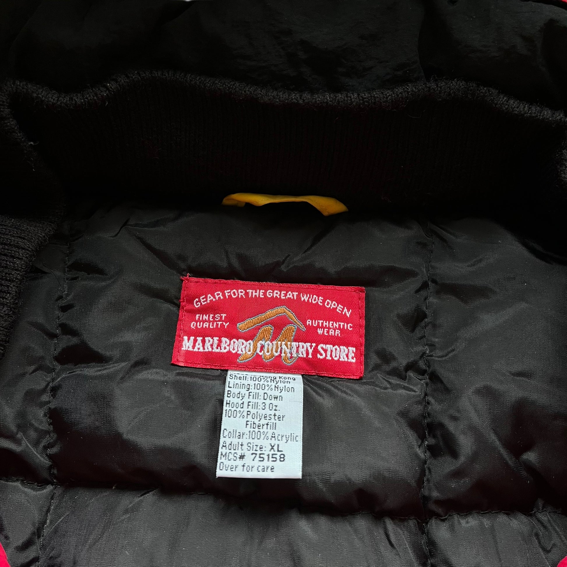 Marlboro country store label stitched inside of men's vintage 90s Marlboro country store hooded red puffer jacket.