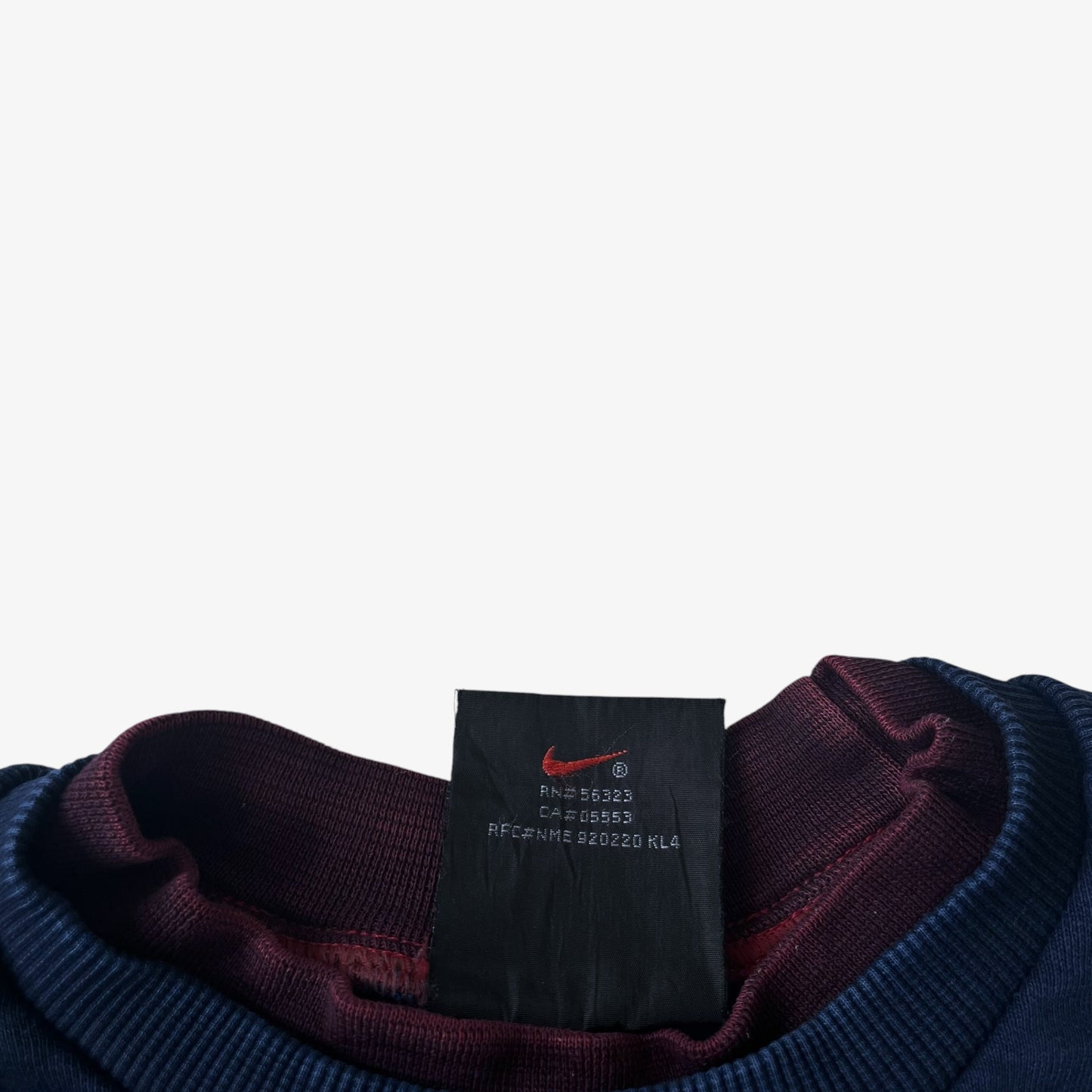 Back of label of a vintage Nike Premier PSG sweatshirt.