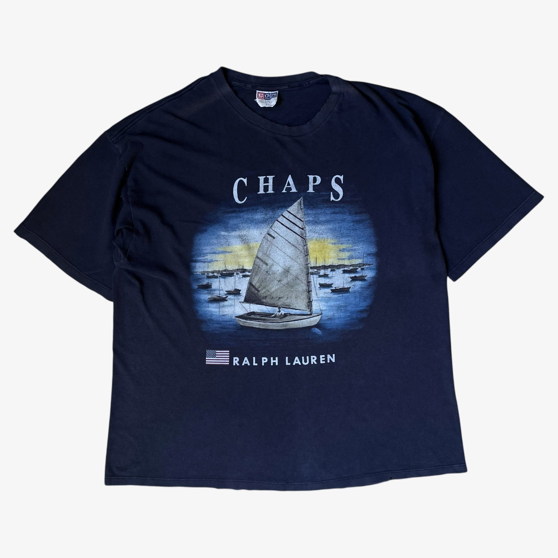 Vintage men's navy thrashed t-shirt with sailing boat graphic and Ralph Lauren Chaps spell out.