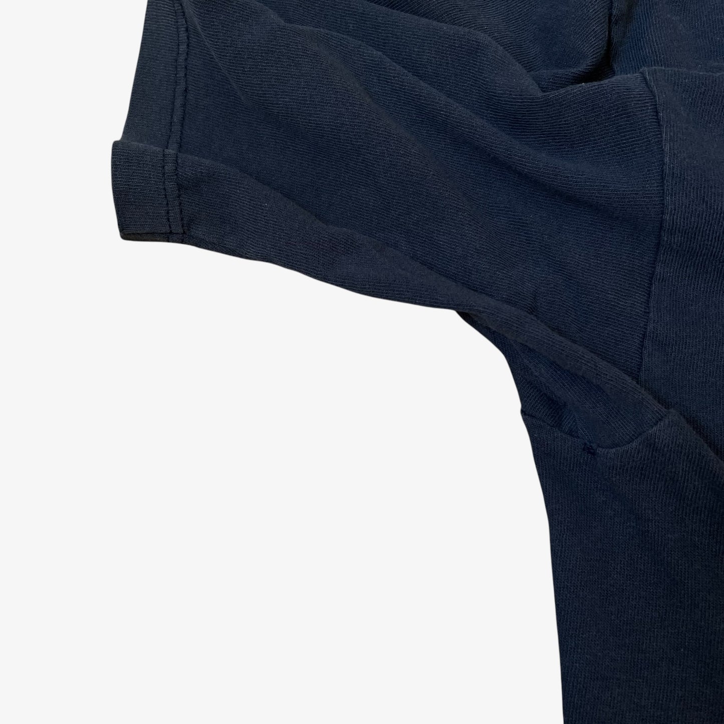 Armpit patina on a vintage 90s men's Ralph Lauren navy thrashed t-shirt.