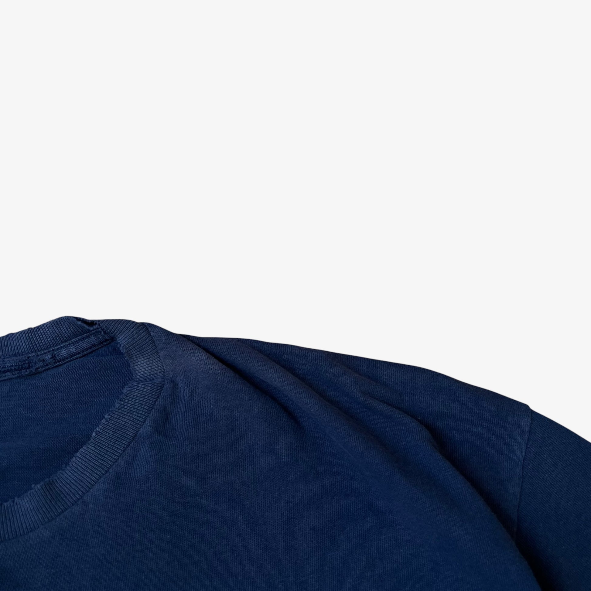 Faded shoulder on a vintage 90s men's Ralph Lauren Chaps navy thrashed t-shirt.