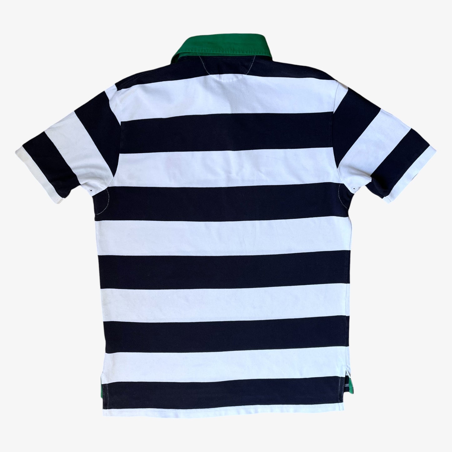 Back of vintage 90s men's Ralph Lauren navy and white striped polo shirt with a contrasting green collar.