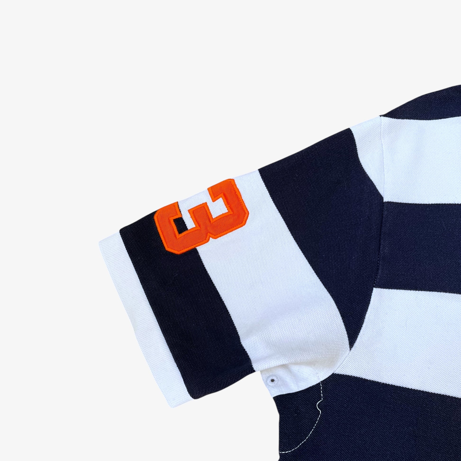 Close up of embroidered three on sleeve of a vintage 90s men's Ralph Lauren navy and white striped polo shirt.