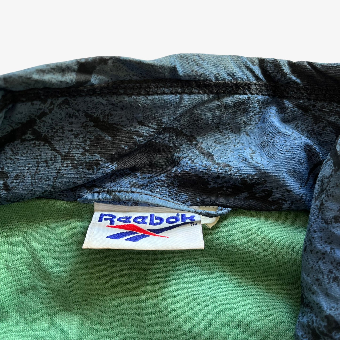 Vintage 90s Mens Reebok Blue Quarter Zip Pullover With Back Abstract Graphic Print Label - Casspios Dream