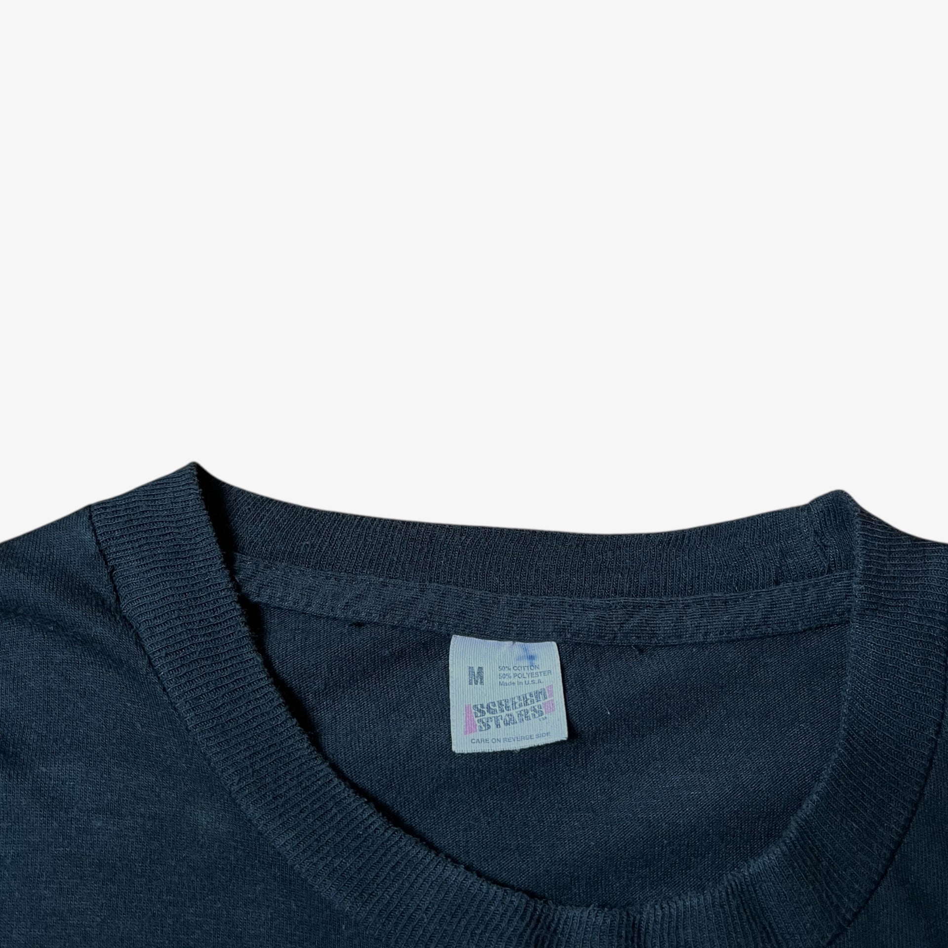 Screen Stars label stitched inside of a vintage 90s men's MTV Jackass Johnny Knoxville print black single stitch t-shirt.