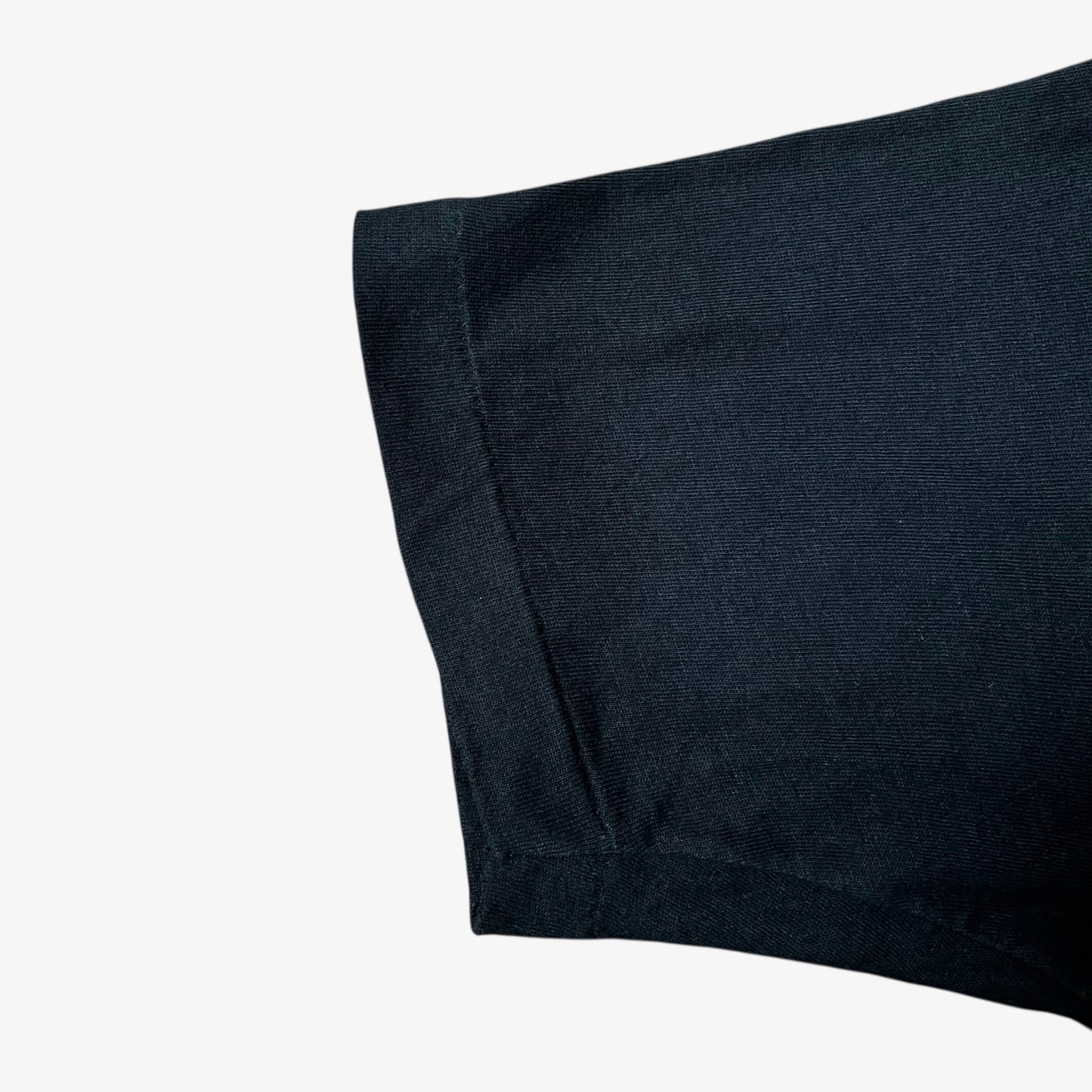 Single stitch short sleeve of a vintage 90s men's Screen Stars MTV Jackass Johnny Knoxville print black t-shirt.