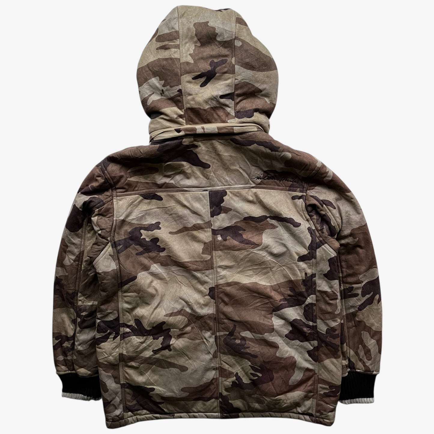 Back of vintage 90s men's Sir Benni Miles green camouflage jacket featuring a faux fur hood.