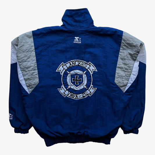 Back of vintage 90s men's Starter USA Marine Corps Lancers VMFA 212 fighter jet squadron blue jacket.