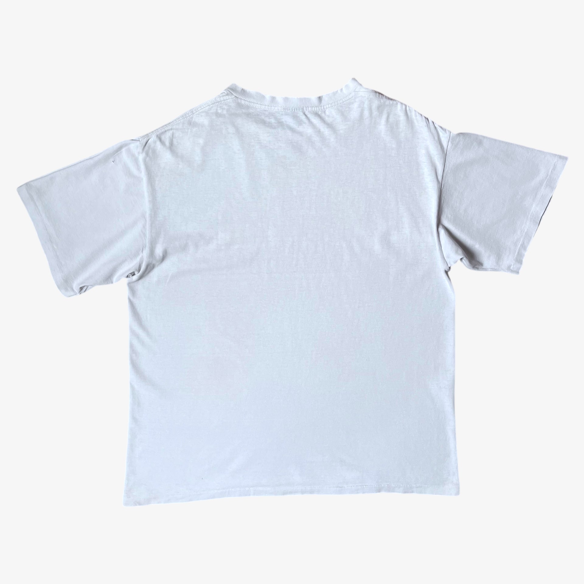 Back of vintage 90s men's Stussy studio Jamaica reggae dance hall print white single stitch thrashed t-shirt.