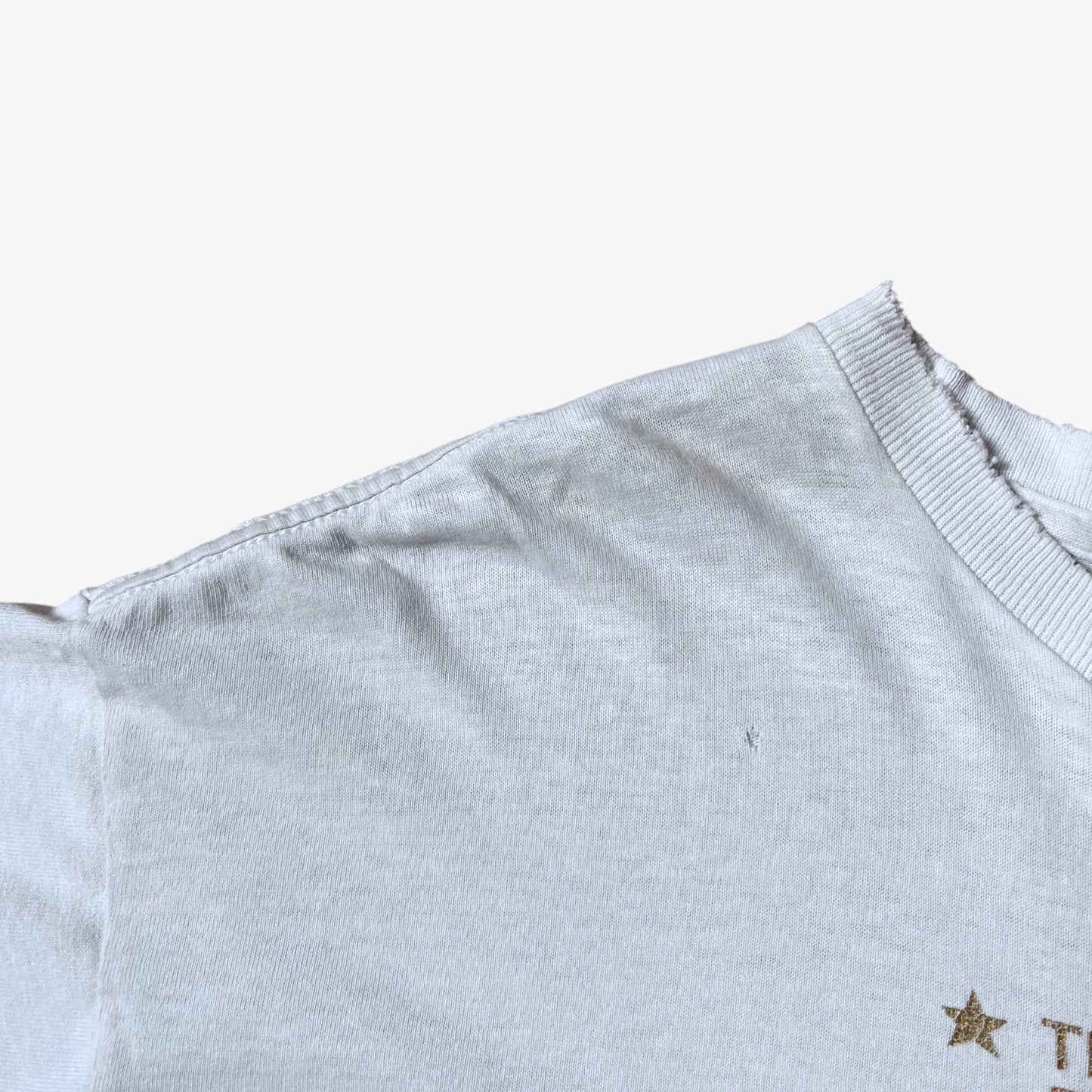 Patina on vintage 90s men's Stussy studio Jamaica reggae dance hall print white single stitch thrashed t-shirt.