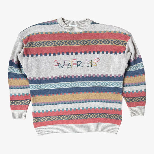 Colourful patterned sweater with 'Sweater Shop' text on a white background