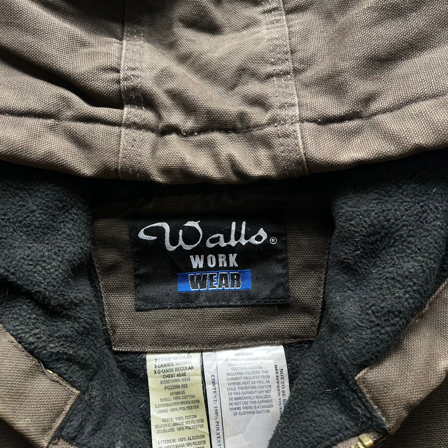 Walls workwear label inside of vintage 90s men's brown hooded chore jacket.