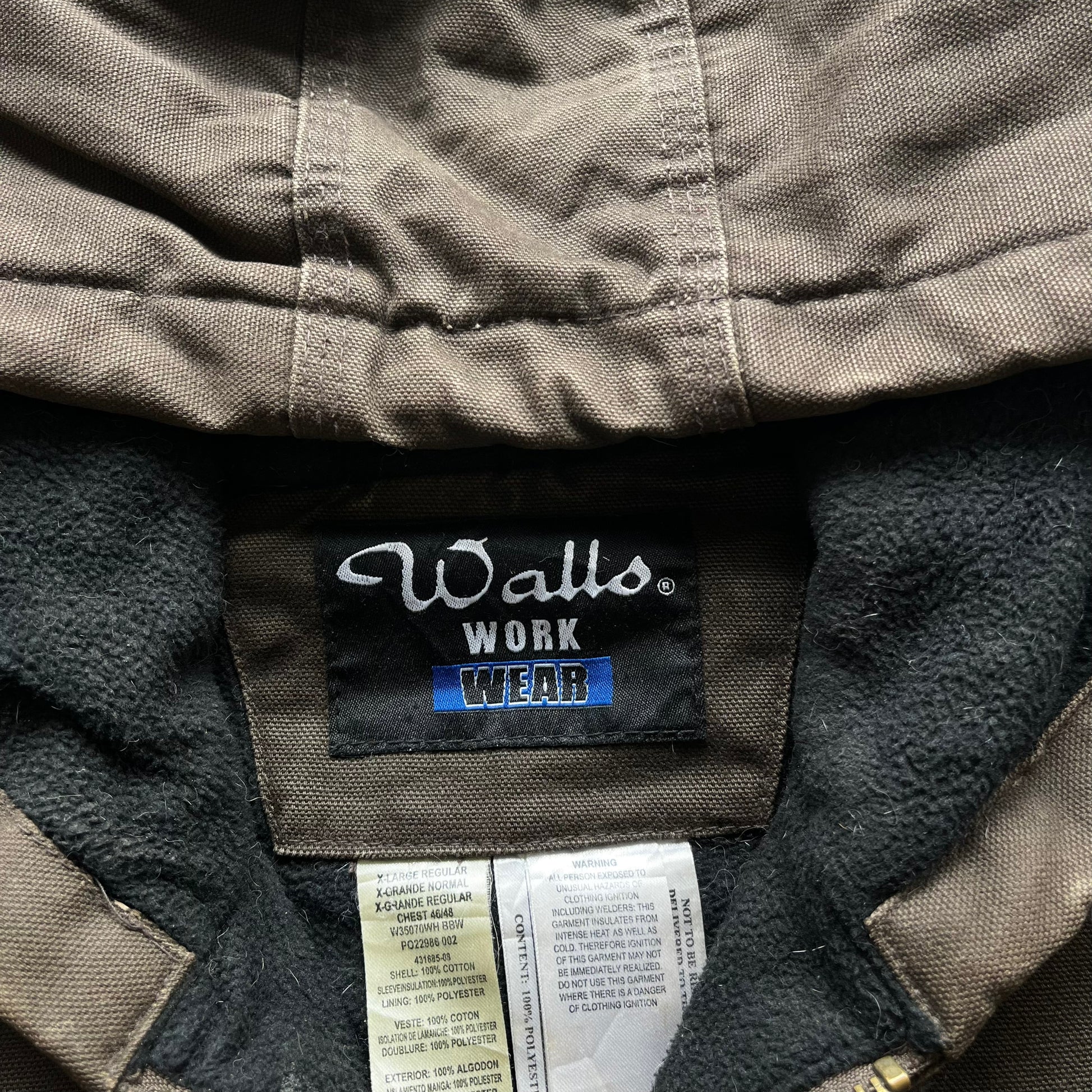 Walls workwear label inside of vintage 90s men's brown hooded chore jacket.