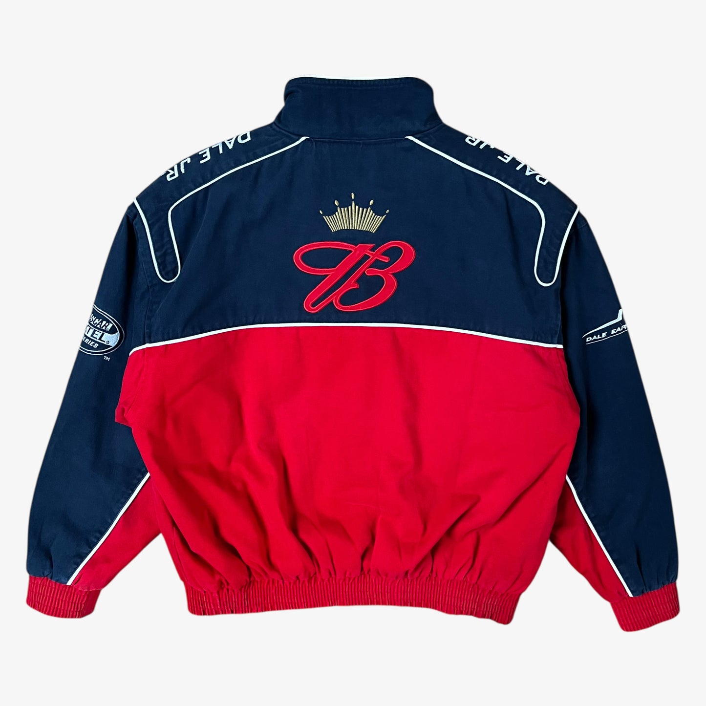 Back of vintage 90s Winner’s Circle Budweiser navy and red NASCAR jacket with embroidered spell-out logo and retro racing style.
