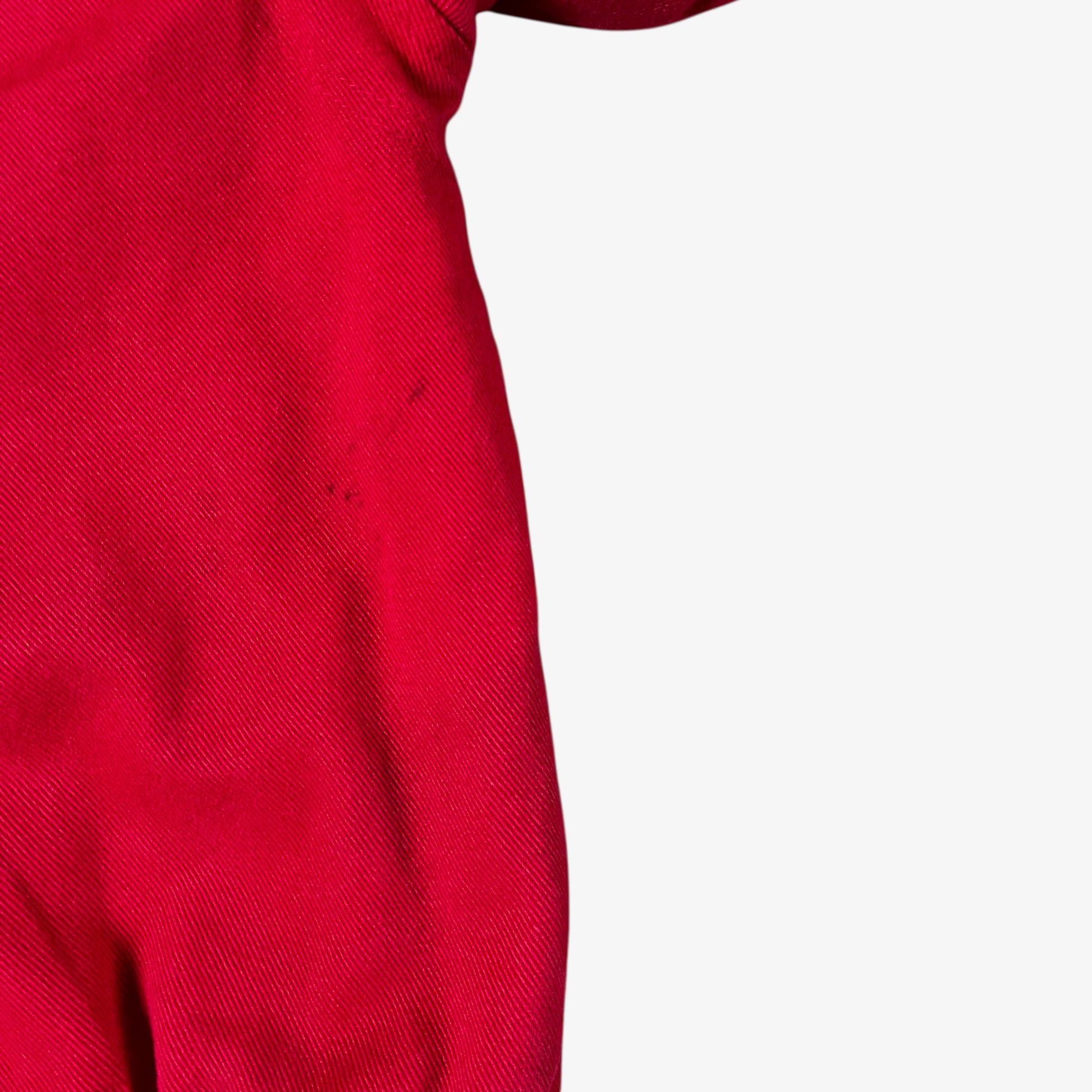 Wear on vintage 90s Winner’s Circle Budweiser navy and red NASCAR jacket.