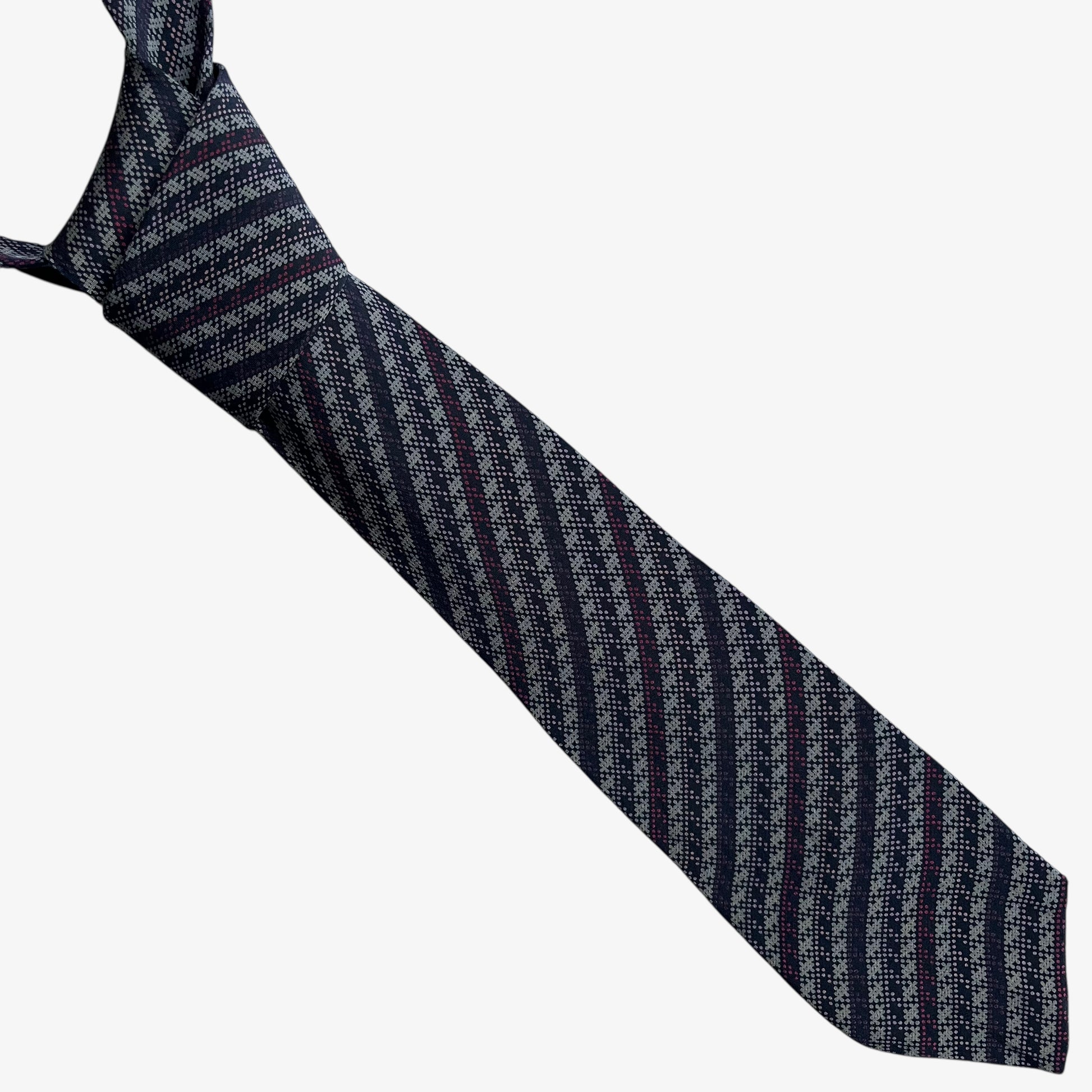 Vintage 90s Missoni abstract striped silk tie on a white background.