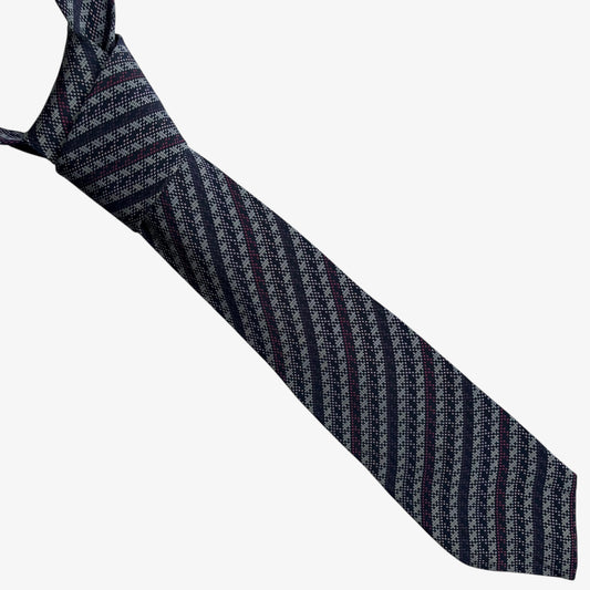 Vintage 90s Missoni abstract striped silk tie on a white background.