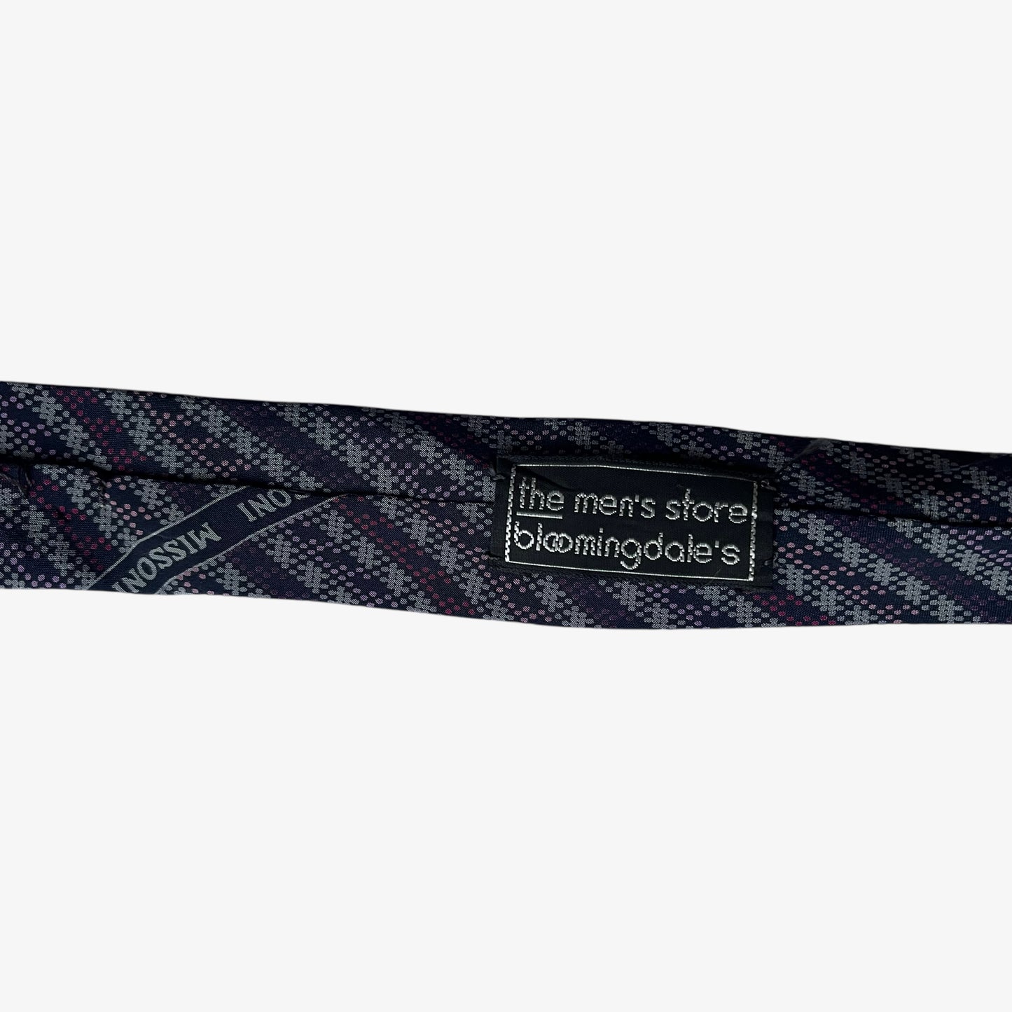 Bloomingdale's label stitched on the back of a vintage 90s Missoni abstract print silk tie.