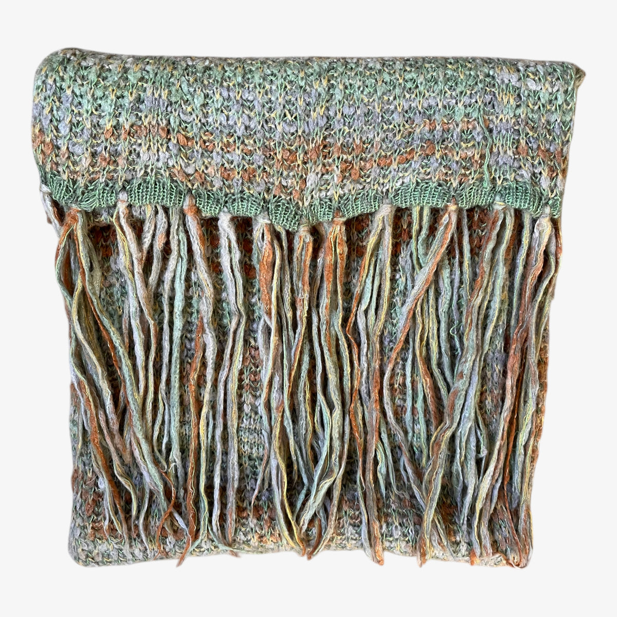 Tassels of vintage 90s Missoni Foulard cashmere and wool blend green knitted shawl.