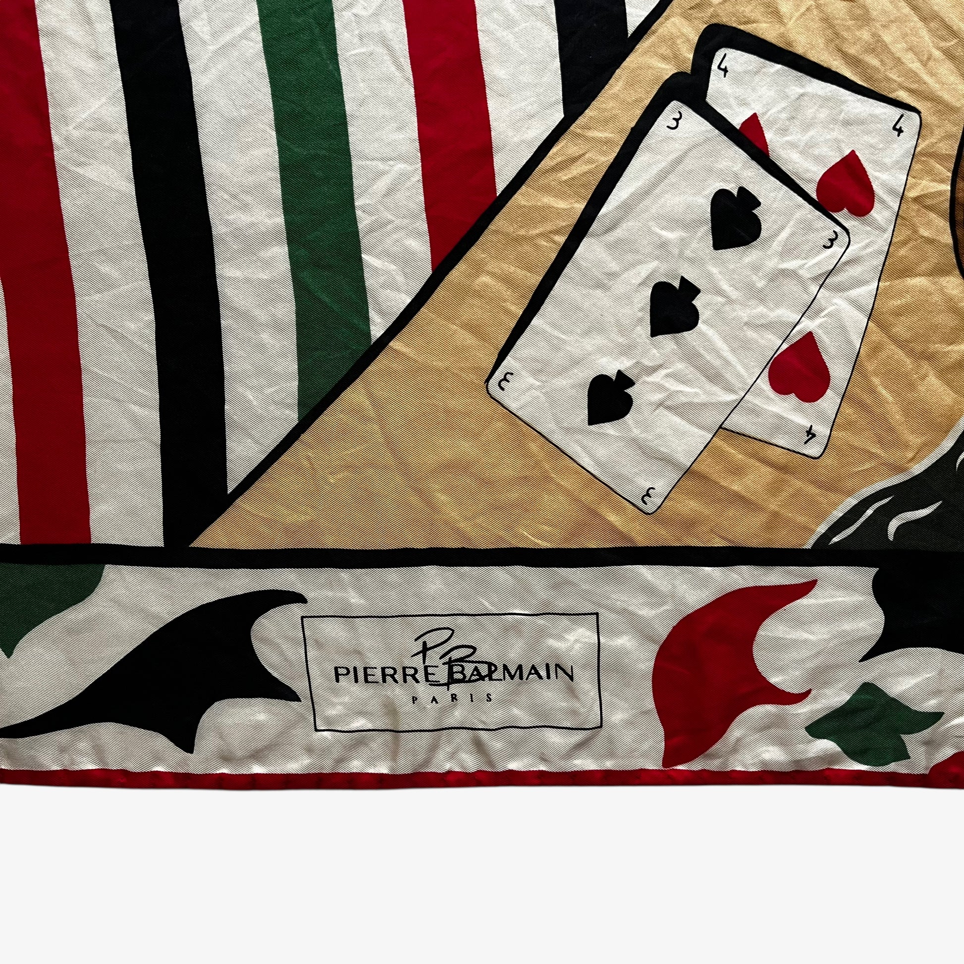 Pierre Balmain Paris spell out logo on vintage 90s women's Peugeot 306 promotional print silk scarf with a red and green racing stripe design.