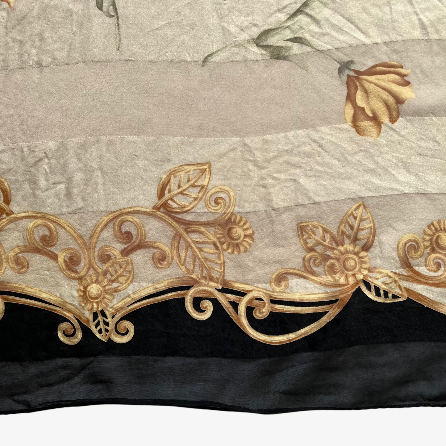 Baroque abstract art deco floral print on women's vintage 90s Pierre Balmain striped yellow and black scarf.