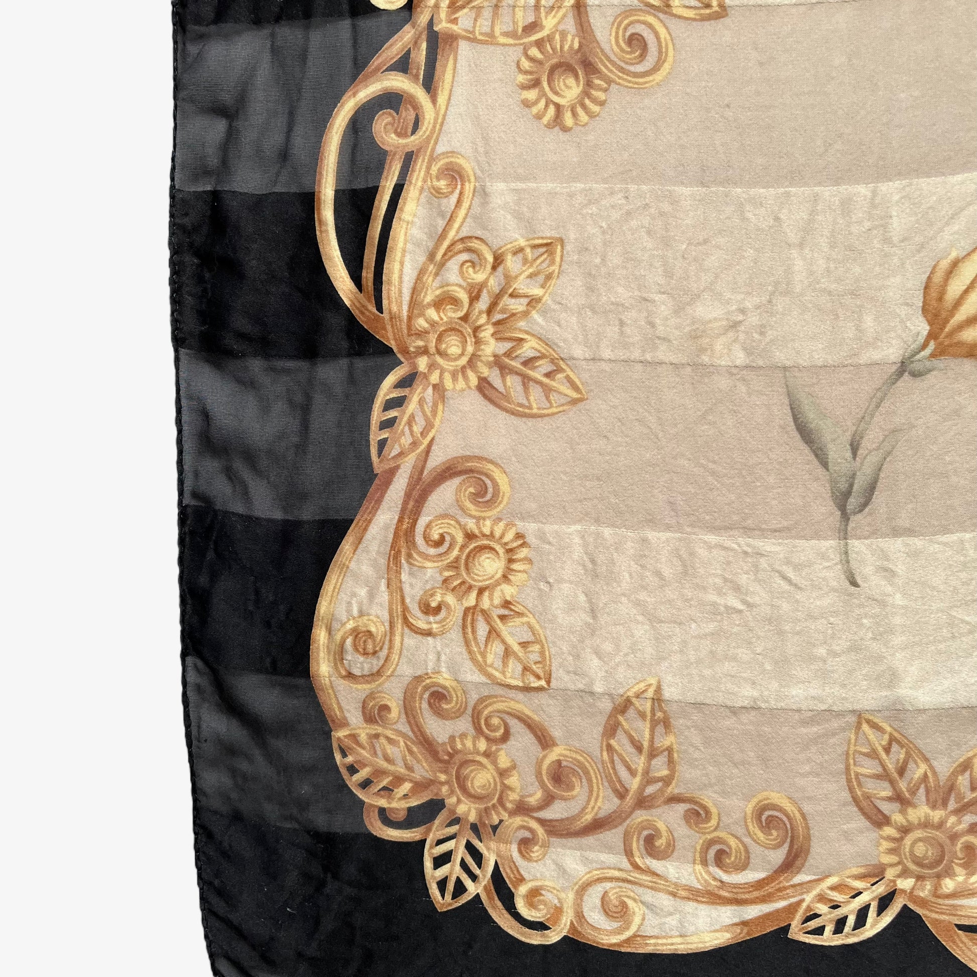 Patina on women's vintage 90s Pierre Balmain Paris yellow floral rose print striped black silk scarf.