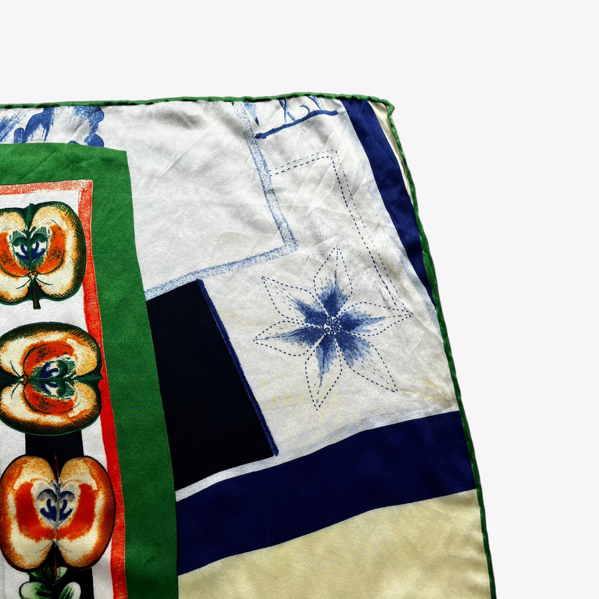General wear of women's vintage 90s Pierre Cardin colourful floral and fruit print silk scarf.