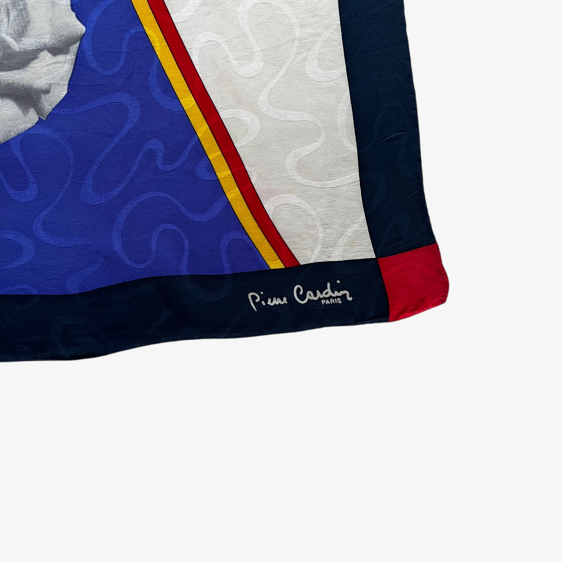 Pierre Cardin Paris printed logo on women's vintage 90s abstract floral and colourful Mondrian styled patterned silk scarf.