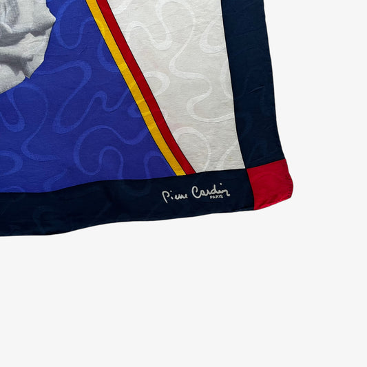 Pierre Cardin Paris printed logo on women's vintage 90s abstract floral and colourful Mondrian styled patterned silk scarf.