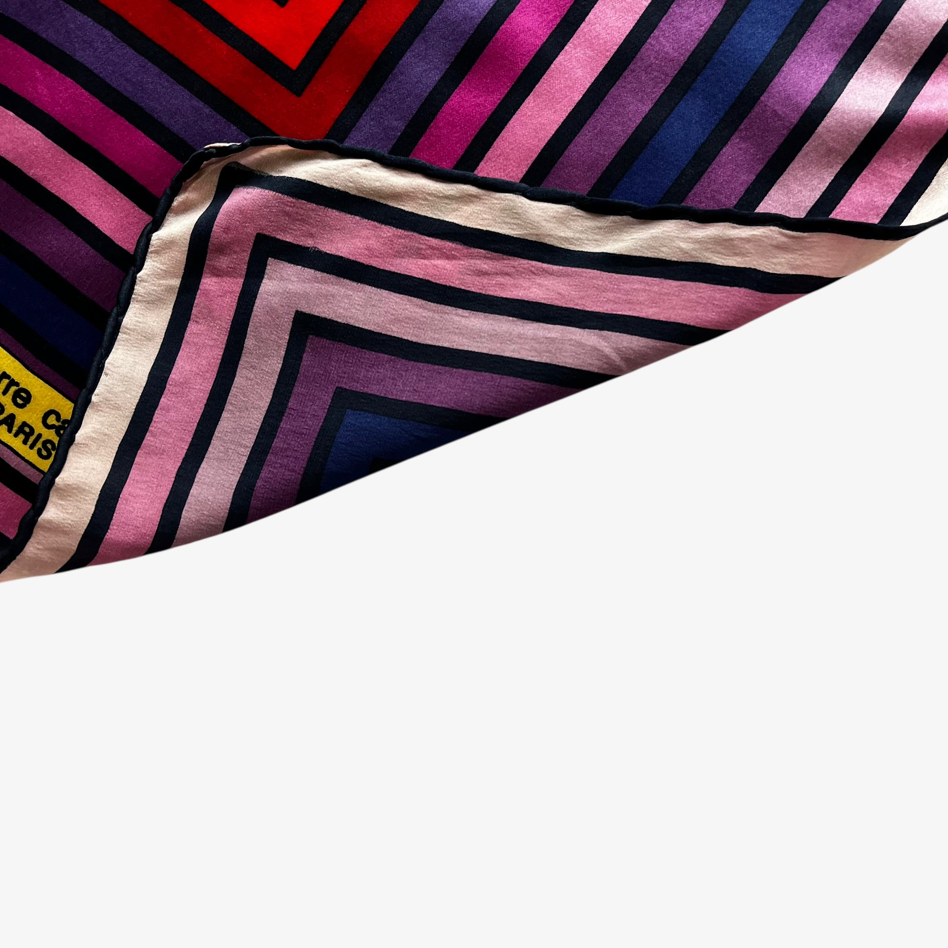 Hand rolled edges on women's vintage 90s Pierre Cardin Paris colourful abstract striped print silk scarf.