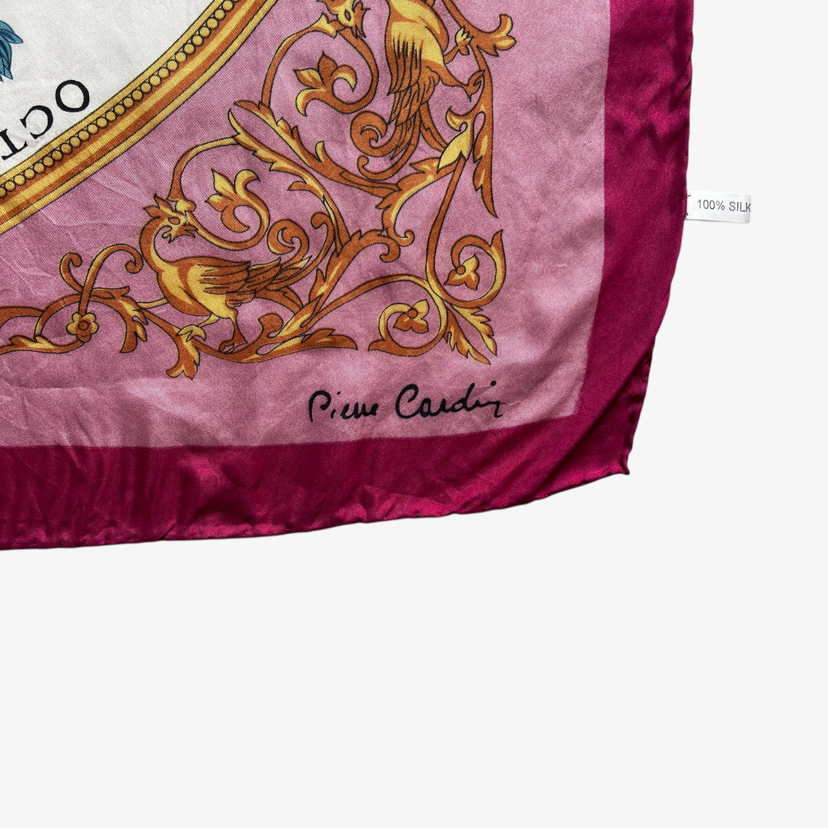 Pierre Cardin spell out logo on women's vintage 90s sun face seasonal calendar print red silk scarf.