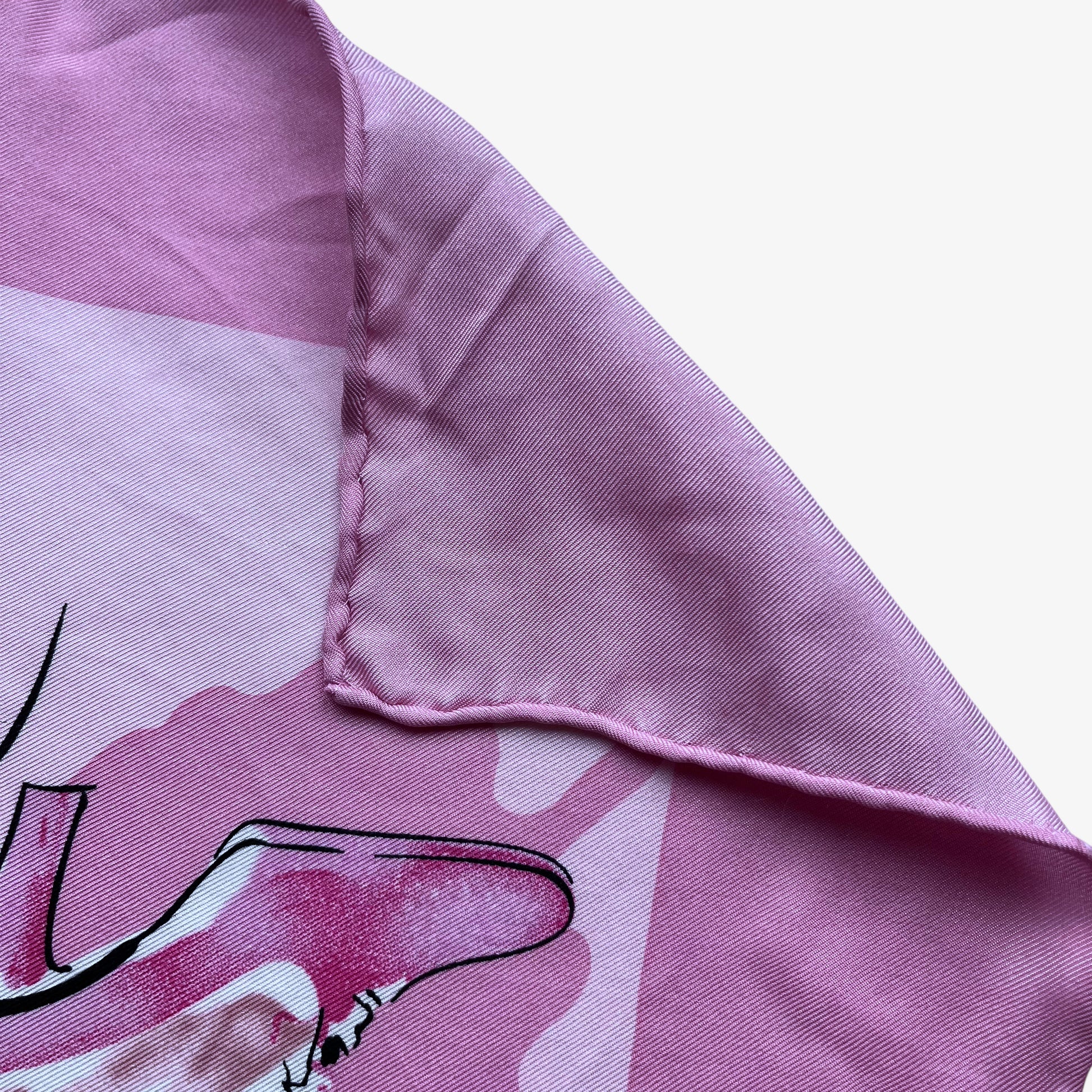 Hand rolled edges on women's vintage 90s Salvatore Ferragamo high heel shoe butterfly print pink silk scarf.