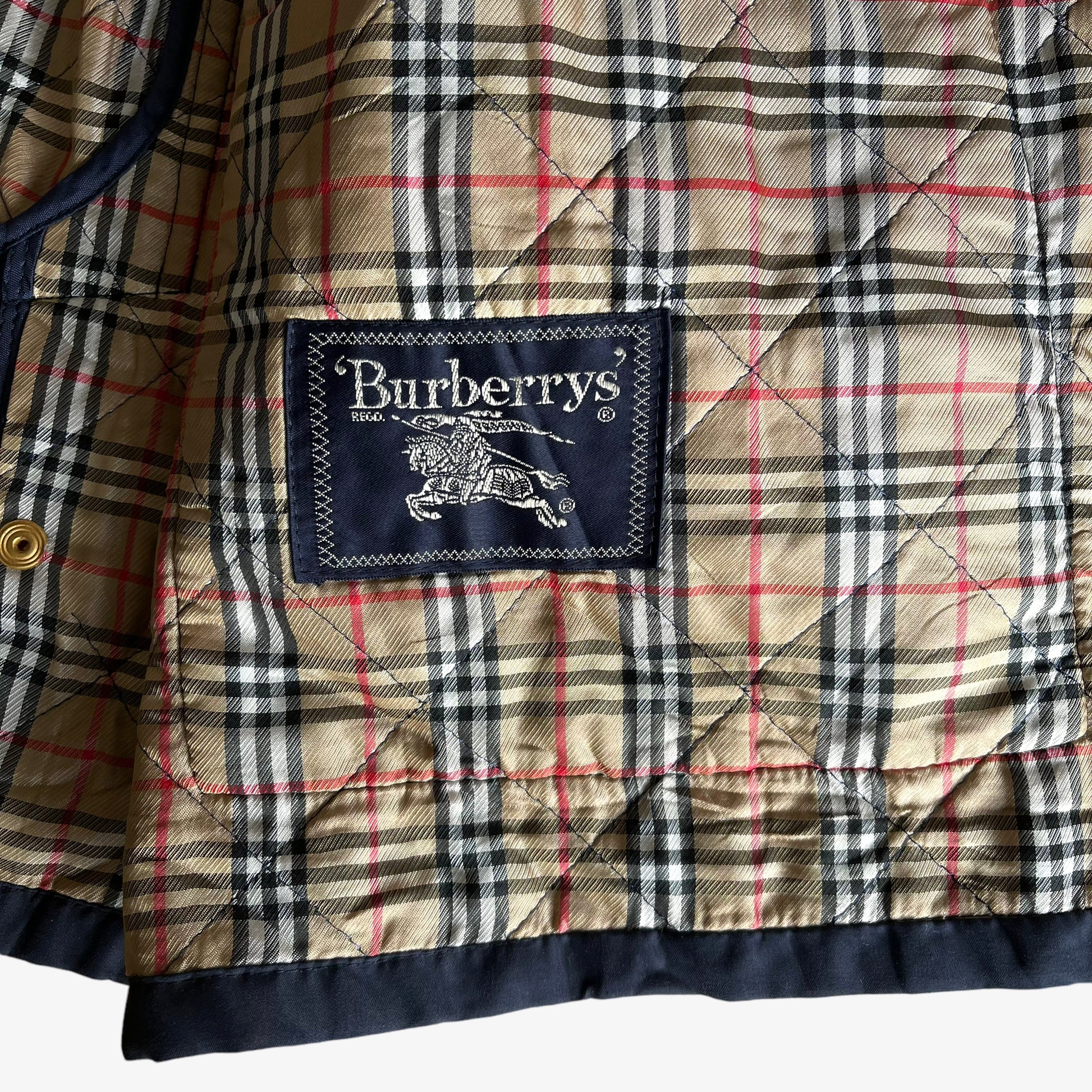 Vintage 80s Womens Burberry Navy Quilted Jacket With Nova Check Lining Label - Casspios Dream
