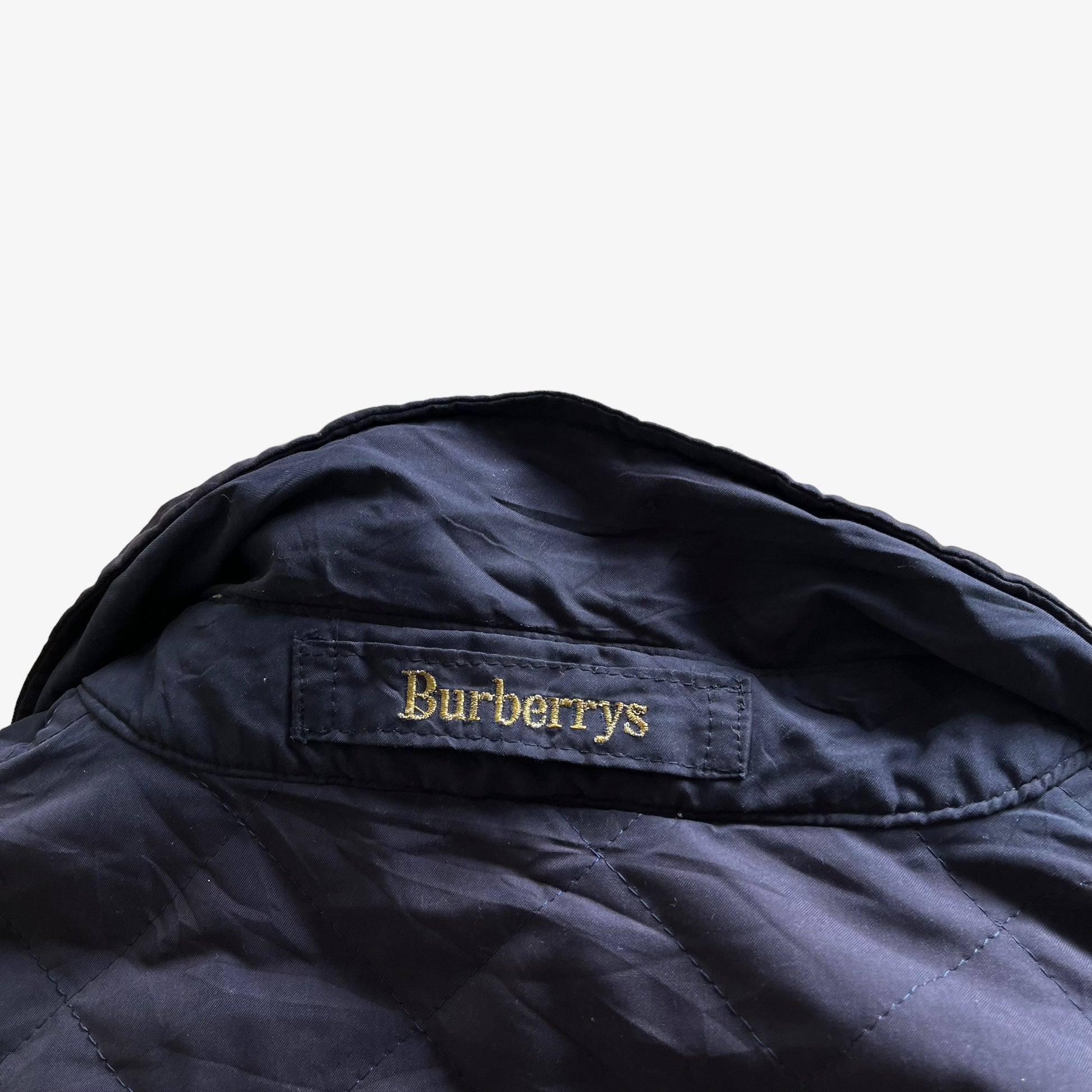 Vintage 80s Womens Burberry Navy Quilted Jacket With Nova Check Lining Logo - Casspios Dream