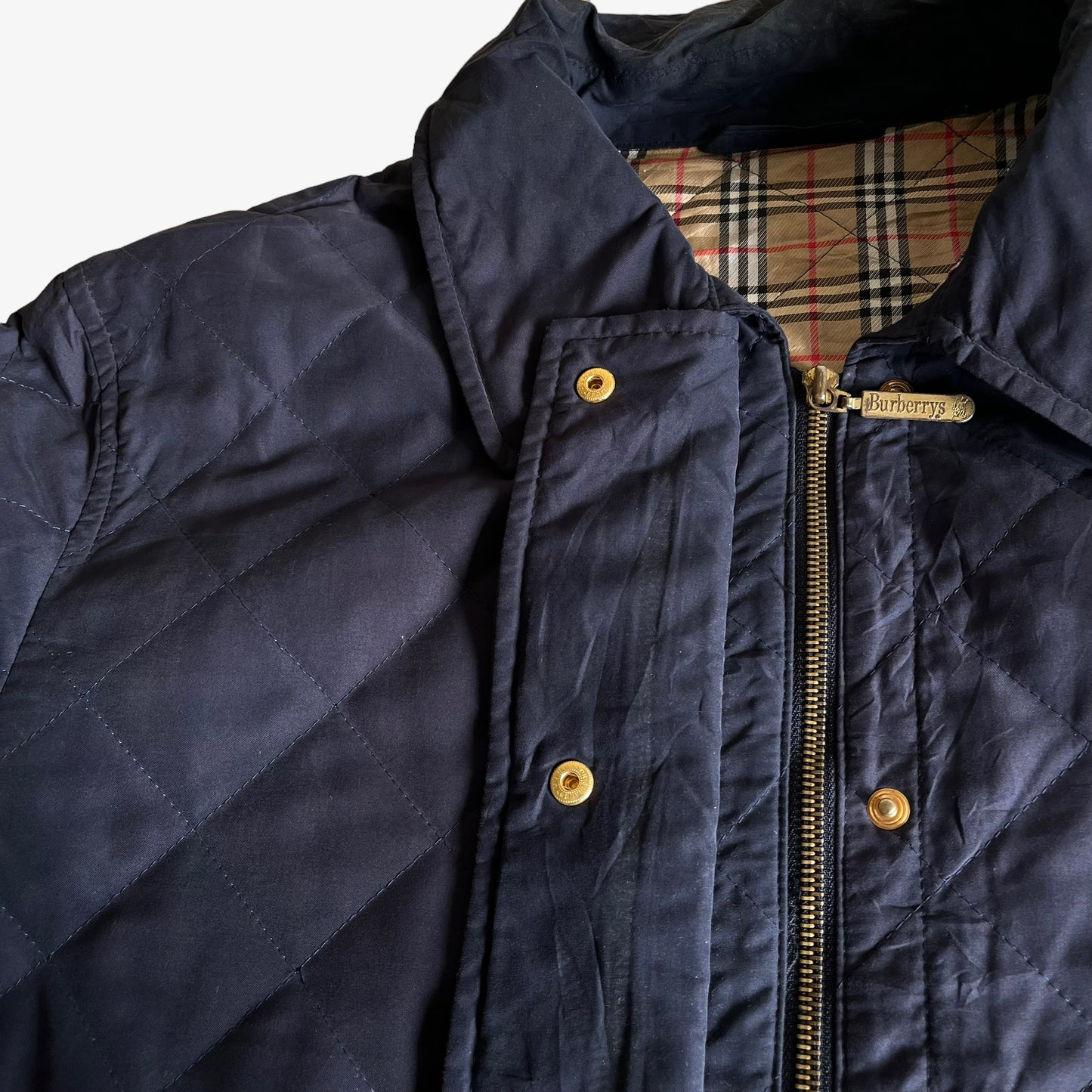 Vintage 80s Womens Burberry Navy Quilted Jacket With Nova Check Lining Zip - Casspios Dream