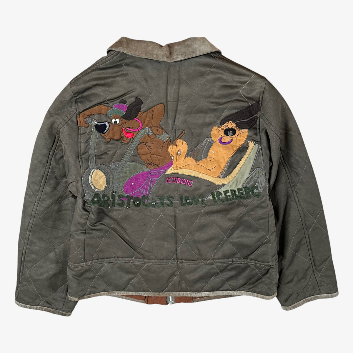 Back of vintage 90s Iceberg women’s khaki quilted bomber jacket with Disney Aristocats embroidery and brown leather collar.