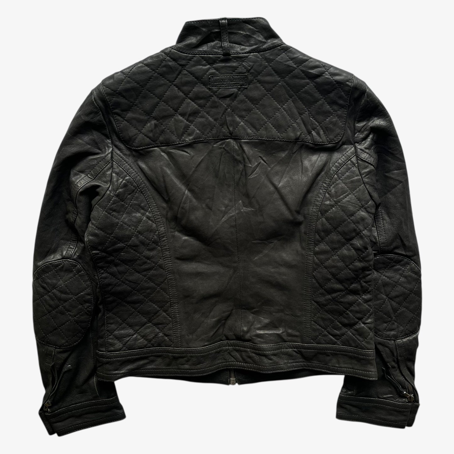 Back of vintage 90s women's Marlboro Classics black quilted leather biker jacket.