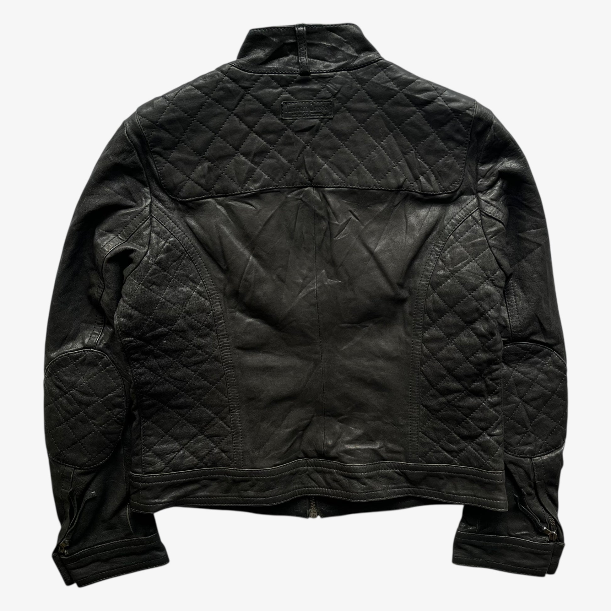 Back of vintage 90s women's Marlboro Classics black quilted leather biker jacket.
