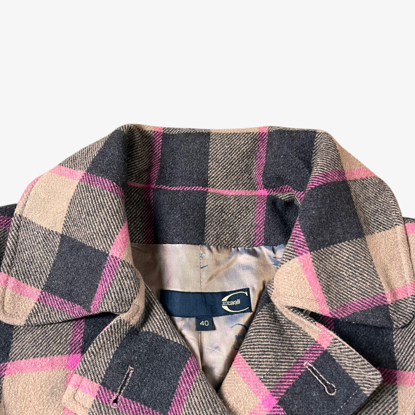 Just Cavalli label inside of vintage 90s Roberto Cavalli women’s brown and pink tartan and plaid double breasted wool blend coat.