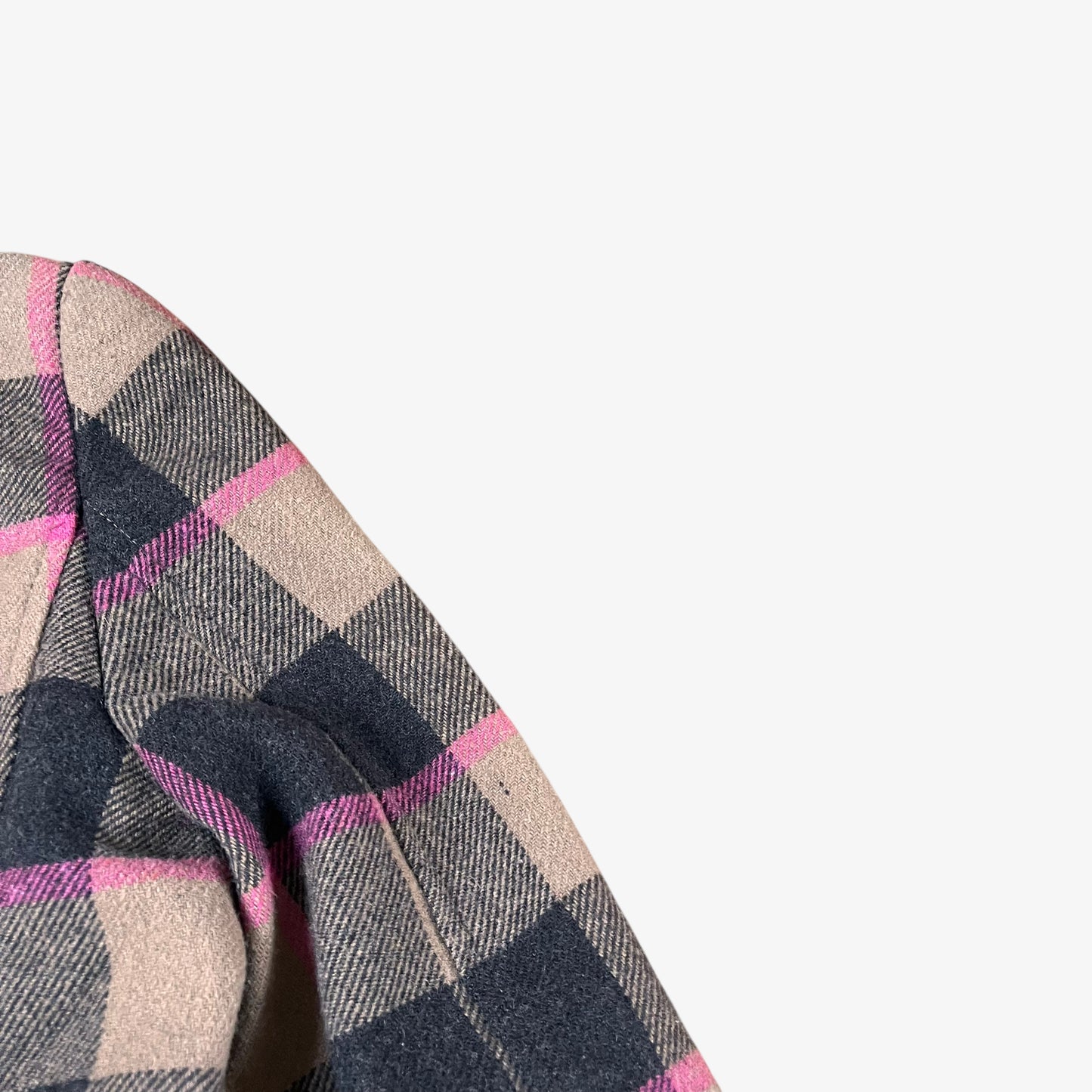 Sleeve of vintage 90s Roberto Cavalli women’s brown and pink tartan and plaid double breasted wool blend coat.