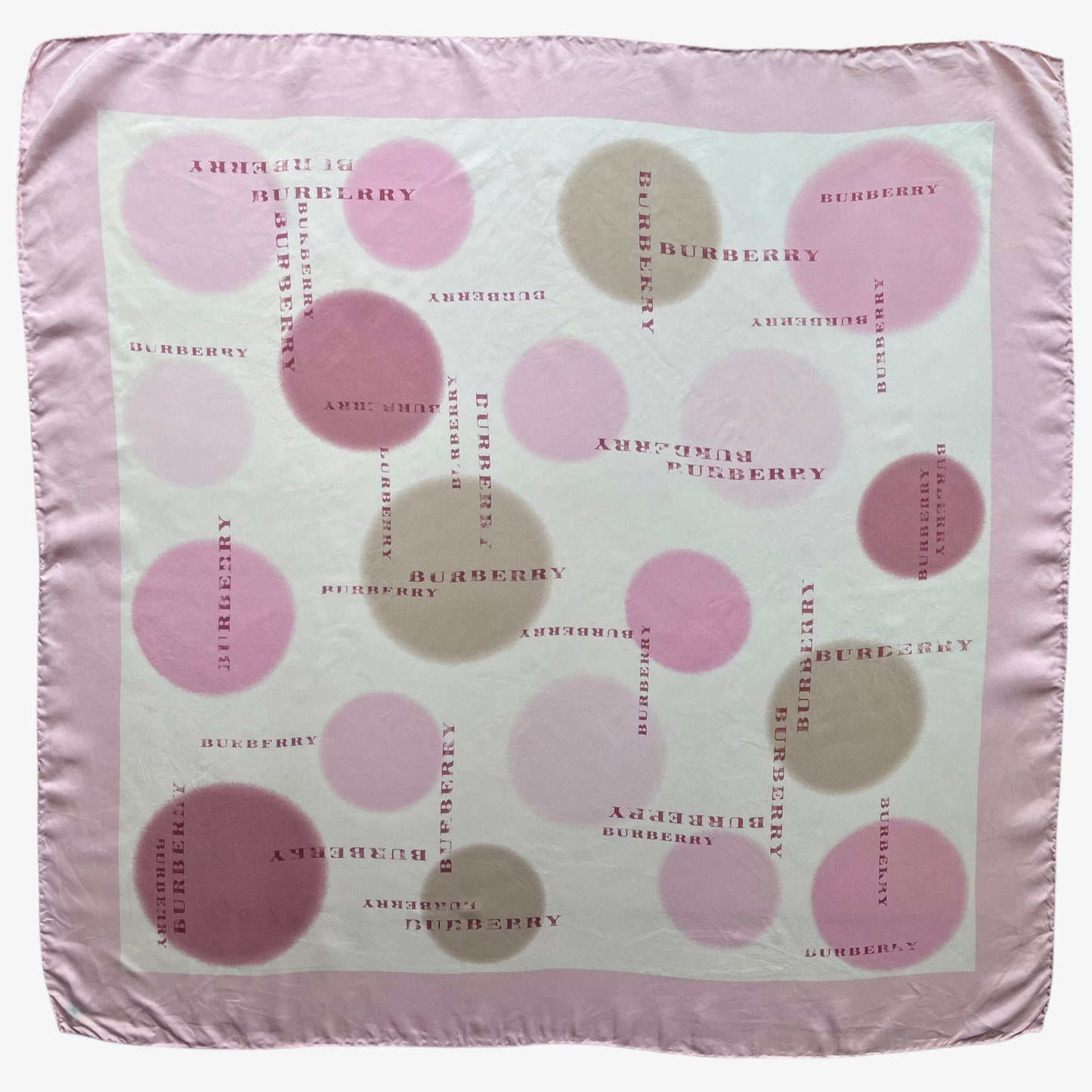 Women's vintage Y2K Burberry polka dot and spell out logo print pink silk scarf.